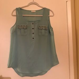 Stud embellished sleeveless blouse